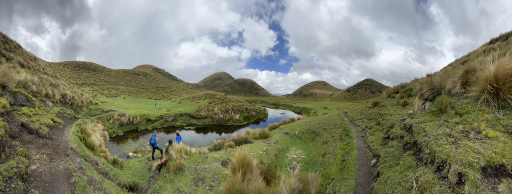Cotopaxi volcano trek - Spring of the Pita River, Páramo (Grassland), Downhill Mountain Biking on Cotopaxi Volcano at 3,760 meters (12,335 ft), Park in Parque Nacional Cotopaxi, Ecuador.